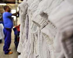 Lavagem de uniformes contaminados